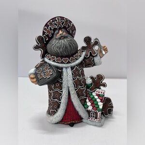 hand-painted ceramic figurine of a Gingerbread Santa. Vintage